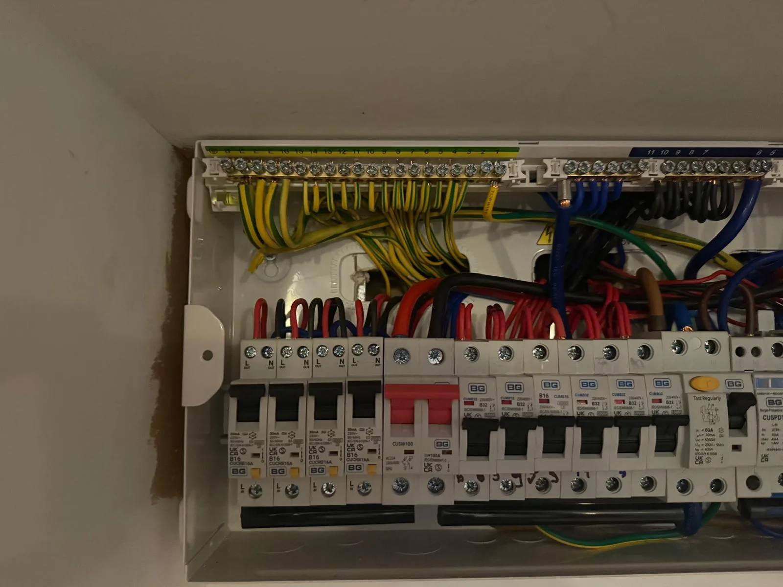 Electrical wiring and circuit breakers inside a distribution board
