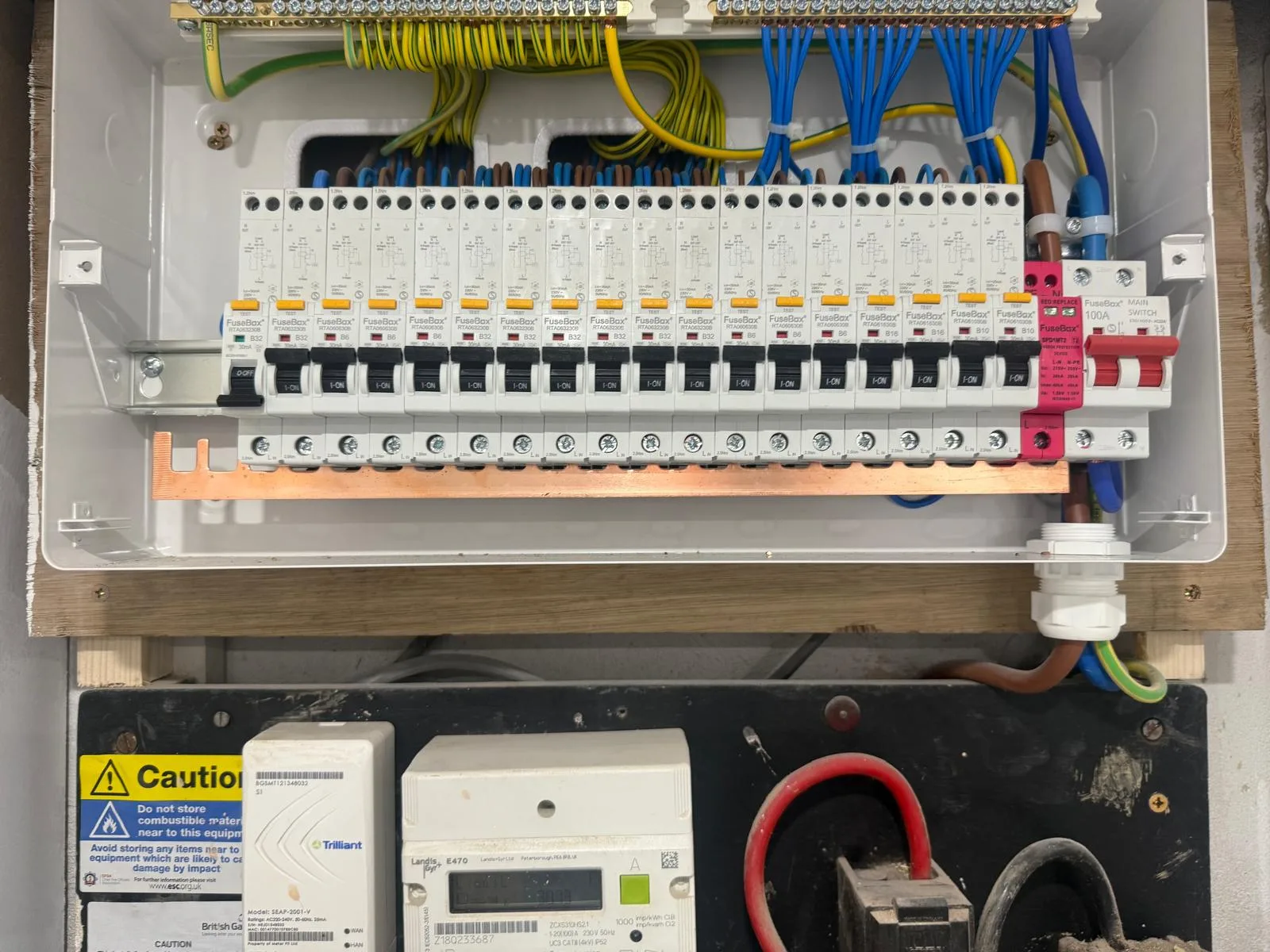 Electrical panel with circuit breakers and wiring displayed clearly