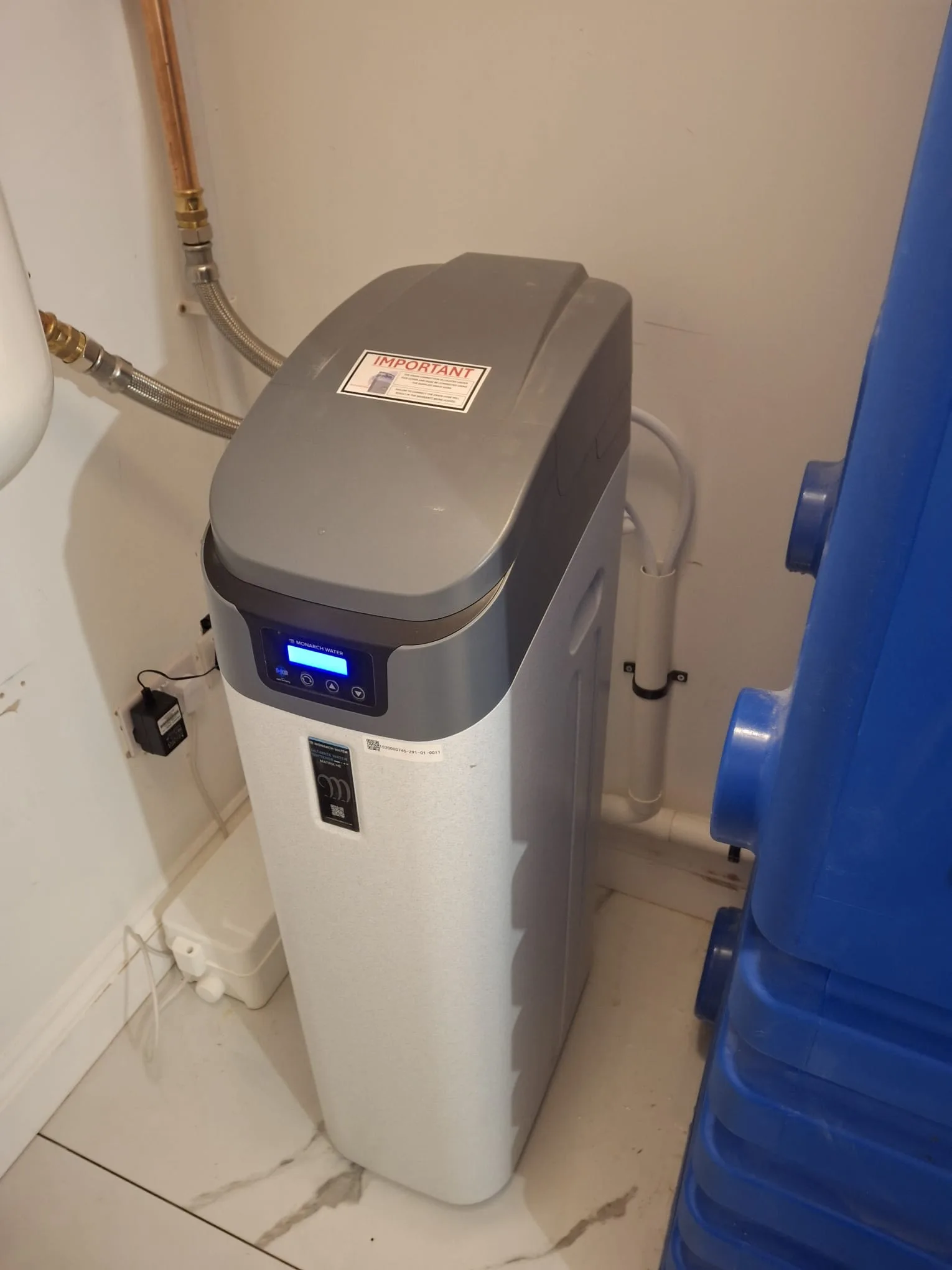 Modern bathroom renovation featuring a smart water softener for enhanced water quality