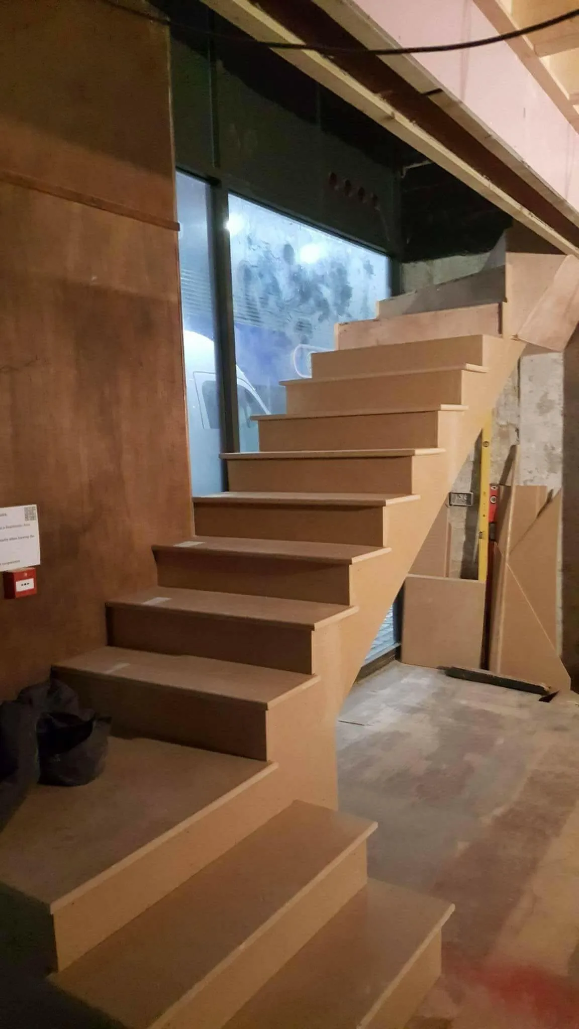 Wooden stairs under construction in a home renovation project